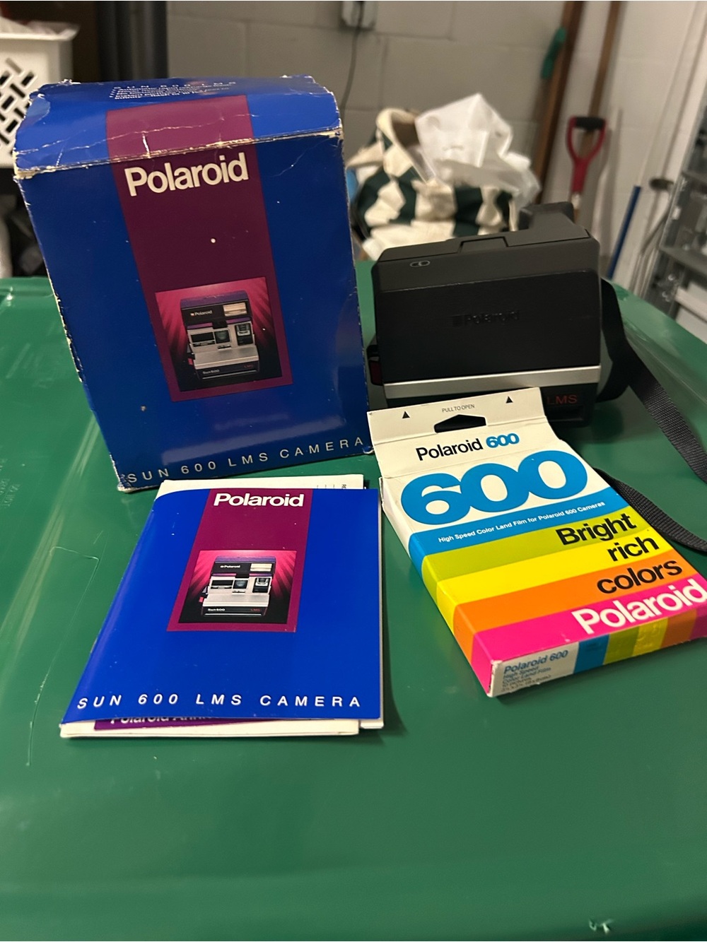 Polaroid Sun 600 LMS Instant Camera with Blue Box and Rainbow Film Pack